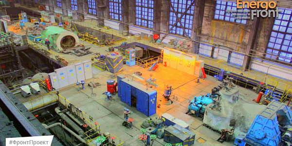 Spacious machine room with large equipment and control cabinets