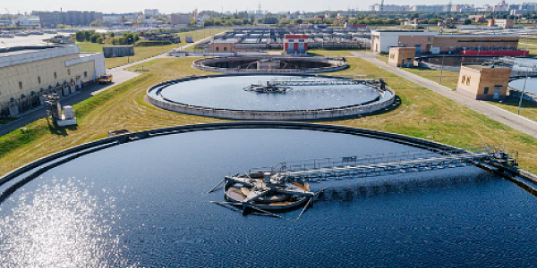 Top view of the round settling tanks of the treatment facilities of the aeration station on a sunny day
