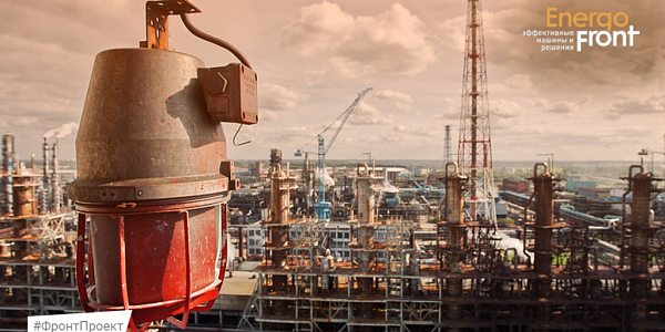 Industrial complex with columns and lantern in the foreground, EnergoFront logo