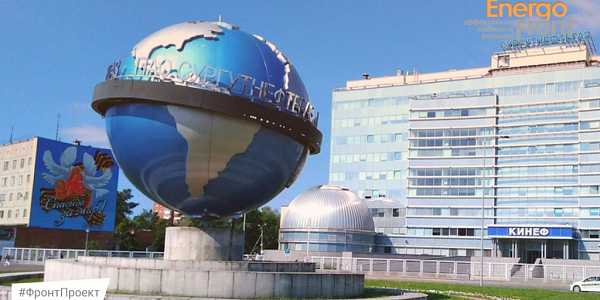 Globe of Surgutneftegaz PJSC near the KINEF building under a clear sky