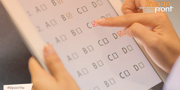 Finger marks answer C in test with options A B C D on tablet
