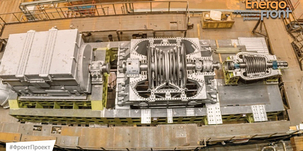 Open rotor of a steam turbine on a frame in a power engineering workshop